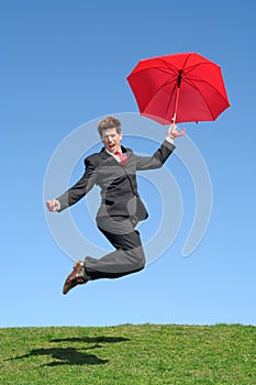 Businessman jumping for joy