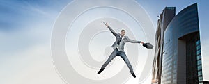 Businessman jumping in joy