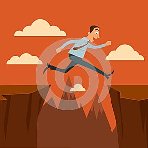 Businessman jumping over a chasms.