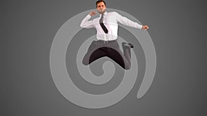 Businessman jumping and punching air on grey background