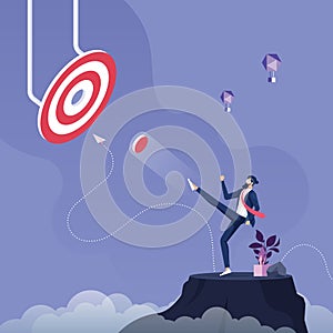 Businessman kick a pieces of big target to success-Business target concept photo