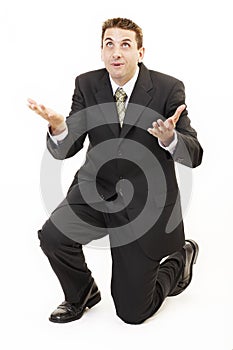 Businessman on knees