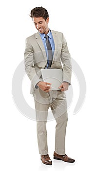 Businessman, laptop and thinking or happy in studio with internet and communication for startup career. Entrepreneur