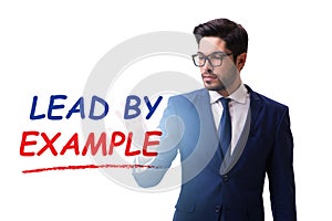 Businessman in lead by example concept
