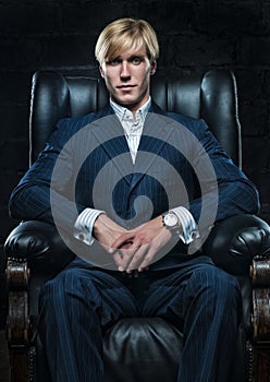 Businessman in leather chair