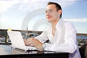 Businessman on leisure with laptop