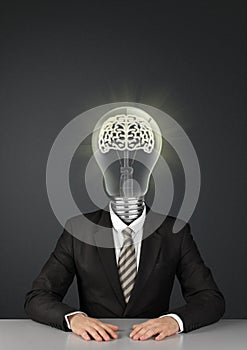 Businessman with light bulb instead of head, great ideas concept