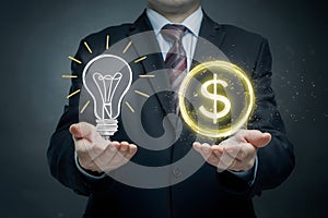 Businessman with lightbulb and glowing dollar sign, symbolizing lucrative ideas and financial success