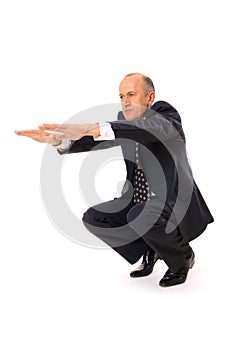 Businessman limbering up