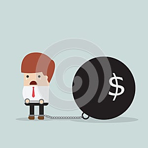 Businessman locked in a debt ball and chain, Debt concept