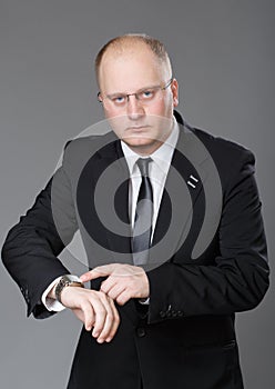 Businessman look his watch