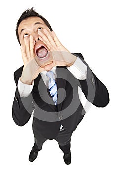 Businessman looking above and shouting