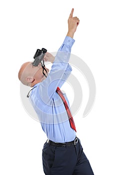 Businessman looking through binoculars