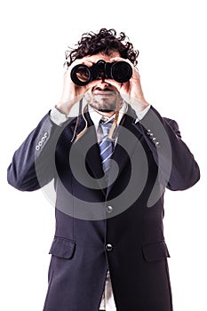 Businessman looking with binoculars