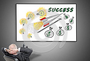 Businessman looking at business success concept