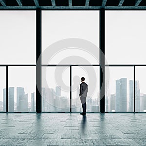 Businessman looking at the city