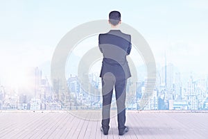 Businessman looking at city