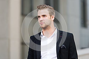 Businessman looking forward future opportunity. Man well groomed suit walk urban background. Businessman handsome office