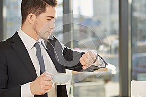 Businessman looking at his watch