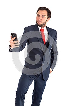 Businessman looking at the mobile phone