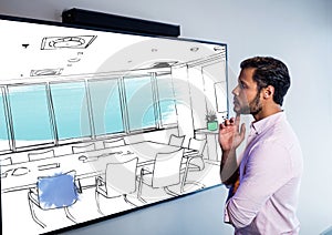 businessman looking the screen on the wall and thinking on the new desing of the new meeting room