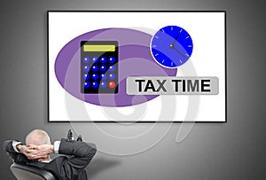 Businessman looking at tax time concept