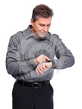 Businessman looking time at his watch.