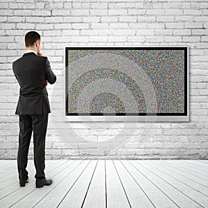 Businessman looking to plasma