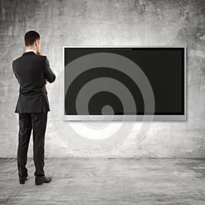 Businessman looking to plasma