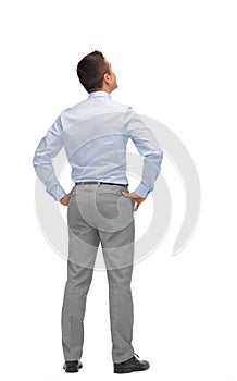 Businessman looking up from back