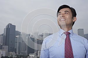 Businessman Looking Up Outdoors