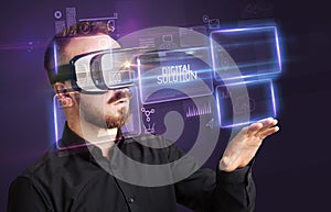 Businessman looking through Virtual Reality glasses, tech concept