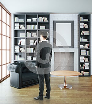 Businessman in luxurious library