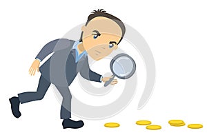 Businessman with magnifying glass looking for money