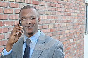 Businessman making a call outside
