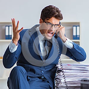 Businessman making copies in copying machine