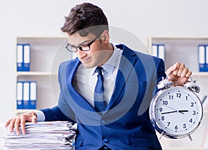 Businessman making copies in copying machine