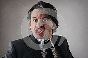 Businessman making funny face