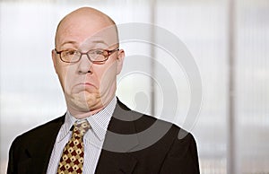 Businessman making a funny face