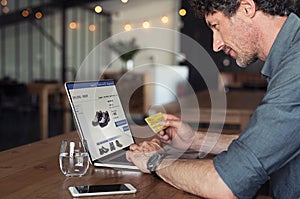 Businessman making online payment photo