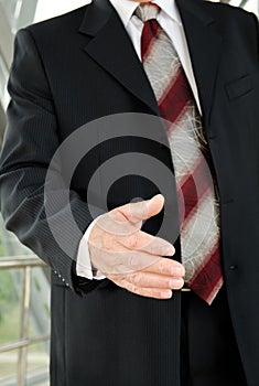 Businessman male hand reached to seal the agreement