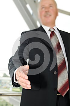 Businessman male hand reached to seal the agreement