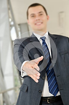 Businessman male hand reached to seal the agreement