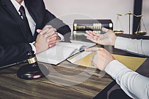 Businessman and Male lawyer or judge consult having team meeting with client, Law and Legal services concept