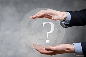 Businessman man hand hold interface question marks sign web. Ask quiestion online, FAQ concept, what where when how and why,