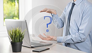Businessman man hand hold interface question marks sign web. Ask quiestion online, FAQ concept, what where when how and why,