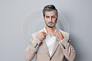 businessman man handsome suit happy beige copyspace smiling portrait studio business