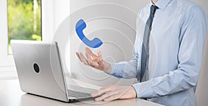 Businessman man hold phone icon.Call Now Business Communication Support Center Customer Service Technology Concept