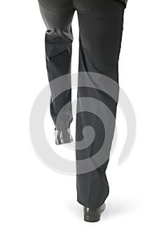 Businessman man imitating stepping up on stairs against white background, closeup. Career ladder concept