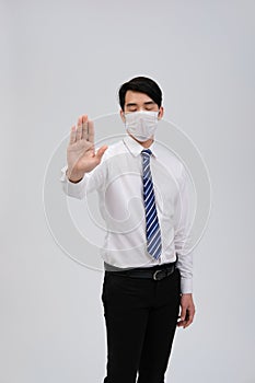 Businessman man wearing protective mask against cold flu virus bacteria infection pollution